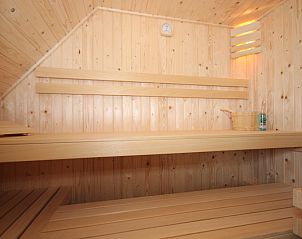 Wooden sauna in Villa De Witte Hoek 138 conservatory, De Cocksdorp Texel for ultimate relaxation.