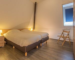 Bedroom with double bed in Type T-3 vacation home, De Cocksdorp, Texel.