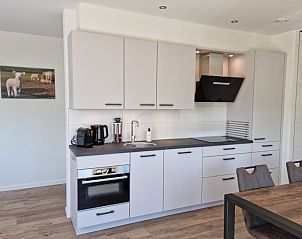 Stilvolle Kche im Ferienhaus De Muy, De Cocksdorp, Texel mit modernen Gerten.