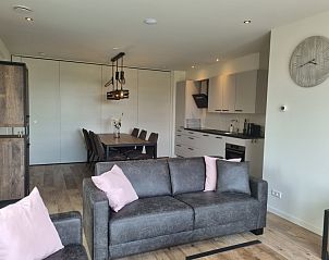 Ess- und Sitzecke im Ferienhaus De Slufter, De Cocksdorp Texel, mit stilvollem Mobiliar.