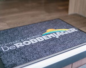 Welcome mat at entrance to Chalet 08 Newport in De Cocksdorp Texel, Wadden Islands.