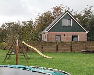 Playground and garden at Duin-/vuurtorenzicht detached vacation home, De Cocksdorp, Texel.
