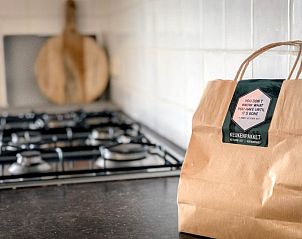 Kitchen package on the kitchen counter in Holiday home De Vuurtoren, De Cocksdorp, Texel.