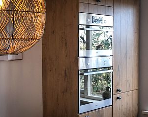 Modern kitchen appliances in Holiday home De Vuurtoren, De Cocksdorp, Texel.