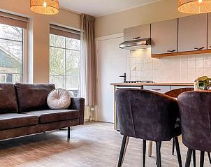 Spacious kitchen and dining area in Holiday home Hogezandskil, De Cocksdorp, Texel, ideal for cozy meals.