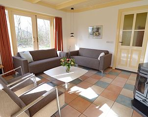 Gezellige woonkamer van De Velduil vakantiehuis in De Cocksdorp Texel
