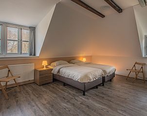 Gerumiges Schlafzimmer im Ferienhaus Typ W, De Cocksdorp Texel, mit bequemen Betten und ruhiger Atmosphre auf den Watteninseln.