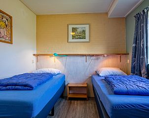 Schlafzimmer mit zwei Betten im Ferienhaus Slufterhoek 180, De Cocksdorp, Texel, fr einen erholsamen Schlaf.