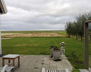 Ruhige Terrasse mit Blick auf die Natur im Vuurtorenweg 58 C Ferienhaus De Cocksdorp Texel.