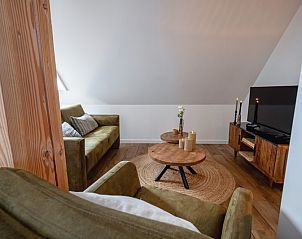 Knusse zithoek in Appartement C, De Cocksdorp, Texel, perfect voor ontspanning.