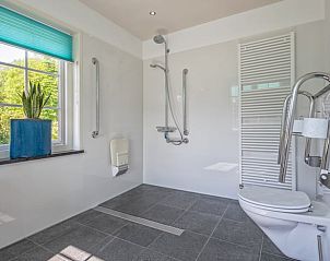 Spacious shower in Cottage in De Cocksdorp, Texel, with modern amenities and lots of light.