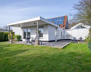 Ferienhaus Slufterduin 52a in De Cocksdorp, Texel mit sonniger Terrasse und grnem Garten.