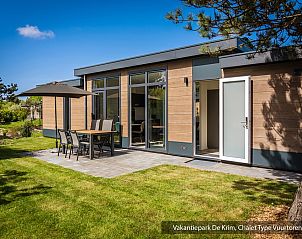 Chalet Typ Vuurtoren de Luxe in De Cocksdorp, Texel mit sonniger Terrasse und grner Umgebung.