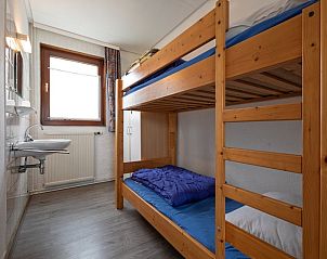 Gemtliches Kinderzimmer mit Etagenbett im Ferienhaus Slufterhoek 056, De Cocksdorp, Texel, ideal fr Familien auf den Watteninseln.