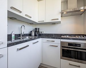 Moderne keuken van Vakantiehuis Slufterhoek 078, Texel, voorzien van alle gemakken.