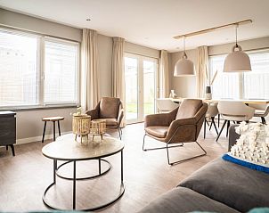 Modernes Esszimmer und Sitzecke im Ferienhaus Typ B-10 Hodshonstraat, De Cocksdorp, Texel, perfekter Aufenthalt auf den Watteninseln.