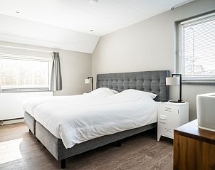 Komfortables Schlafzimmer im Ferienhaus Typ B-10 Hodshonstraat, De Cocksdorp, Texel, erholsame Nchte auf den Watteninseln.
