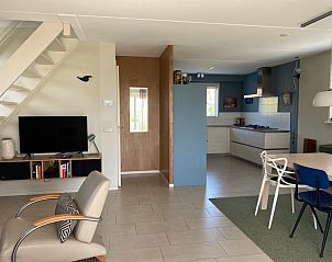 Modern kitchen and dining area in Frederik and Lodevika vacation home, De Cocksdorp, Texel.