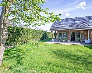 Ferienhaus De Razende Bol in De Cocksdorp Texel mit groem Garten und Terrasse.