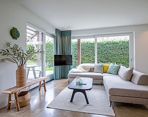 Gemtliches Wohnzimmer im Ferienhaus De Razende Bol, De Cocksdorp Texel.