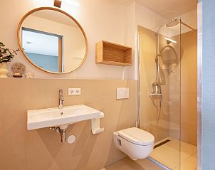 Luxurises Badezimmer im Ferienhaus De Razende Bol, De Cocksdorp Texel.