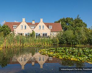 Familievilla 8 persoons in De Cocksdorp, Texel, met prachtig uitzicht op de vijver en groene omgeving.