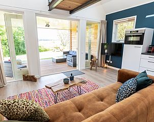 Blick auf die Veranda vom Wohnzimmer der Zeewinde, De Cocksdorp, Texel. Genieen Sie die Natur der Waddeninseln.