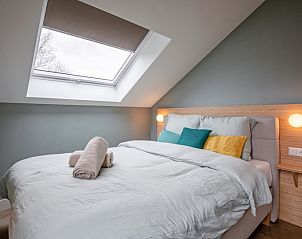 Gemtliches Schlafzimmer mit Dachfenster im Ferienhaus Brakzand, De Cocksdorp Texel.