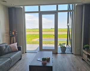 Panoramic view from vacation home Eierland in De Cocksdorp, Texel, with access to the terrace.