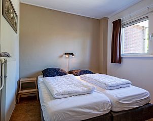 Comfortable bedroom in Holiday home Slufterhoek 132, De Cocksdorp, Texel, with double bed