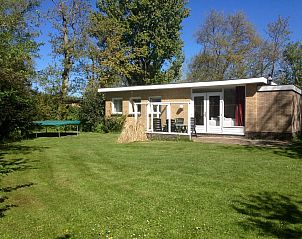 Vacation home Slufteroord 270 in De Cocksdorp Texel with spacious garden and terrace, ideal for a relaxing stay on the Wadden Islands.
