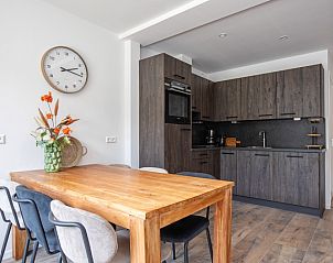 Modern kitchen in Holiday home Slufterhoek 104, De Cocksdorp Texel, fully equipped for a comfortable stay.
