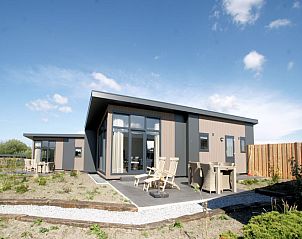 Chalet 05 Nevada in De Cocksdorp Texel met modern terras en tuin, ideaal vakantiehuis op Waddeneilanden.