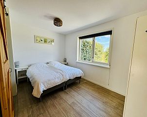 Komfortables Schlafzimmer in Texels Ferienhaus, De Cocksdorp, Texel mit Aussicht.