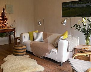 Atmospheric indoor room in Cottage in De Cocksdorp, Texel, with stylish decor and cozy atmosphere.