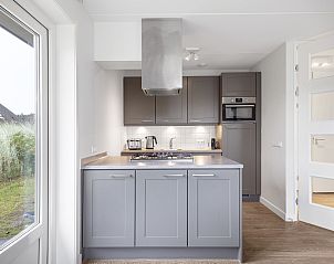 Gerumige Terrasse mit Gartenmbeln im 6-Personen-Bungalow Sluftervallei, Texel.