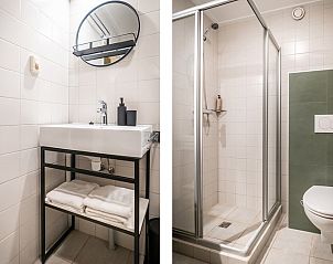 Guest house 0101822 - Holiday property Texel - Tweepersoonskamer met uitzicht op de gezellige Kikkertstraat