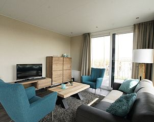 Cozy living room in Chalet 27 Newbay, vacation home in De Cocksdorp Texel.