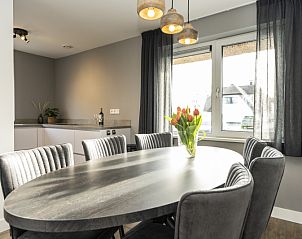 Esszimmer mit Aussicht im Ferienhaus Duinoord Texel, De Cocksdorp, Waddeninseln.