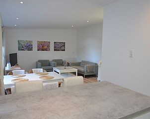 Cozy living room in Boodtlaan 7 / Dennenheuvel vacation home, De Koog, Texel, with comfortable seating area.