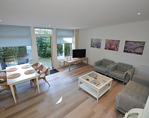 Bright living room of Boodtlaan 7 / Dennenheuvel vacation home, De Koog, Texel, with access to terrace.