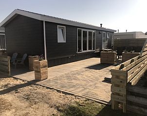 Chalet Bregkoog 231 in De Koog, Texel with spacious terrace and modern look at Chaletpark Bregkoog.