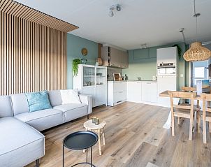 Heller Wohnraum im Apartment Juliana 140 Insel- und Meerblick, De Koog, Texel mit moderner Einrichtung.