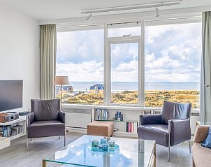 Apartment Juliana 160 Zeezicht in De Koog, Texel offers a beautiful view of the sea from the comfortable living room.