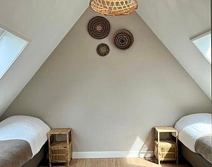 Zweites Schlafzimmer im Ferienhaus Noordwester, De Koog Texel mit zwei Einzelbetten