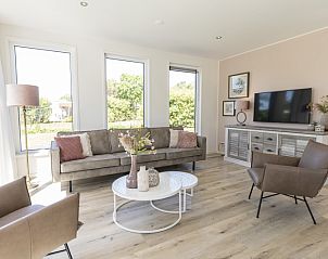 Stylish living room in Villa 35a, De Koog, Texel with lots of natural light.