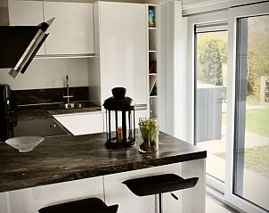 Stylish kitchen in Stappeland - Huize 100-1, vacation home in De Koog, Texel, with modern amenities.