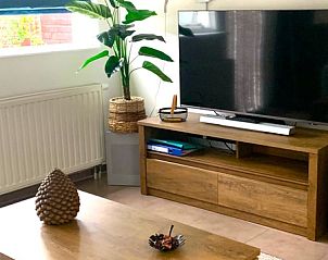 Gemtliche Sitzecke mit TV im Duo-Bungalow, Ferienhaus in De Koog, Texel auf den Watteninseln.