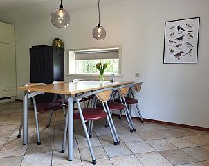 Dining area in Agter Mienterglop - Holiday home 5102 in De Koog Texel with stylish decor.