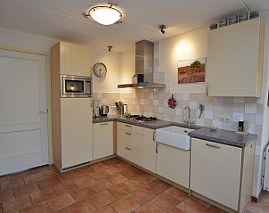 Modern kitchen in Holiday home 7K, De Koog, Texel with complete amenities for a comfortable stay on the Wadden Islands.